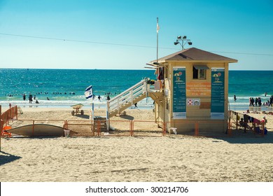 TEL AVIV, ISRAEL - JUNE 4, 2015: Building lifeguards on the beach of Tel Aviv. June 4, 2015. Tel Aviv, Israel.
