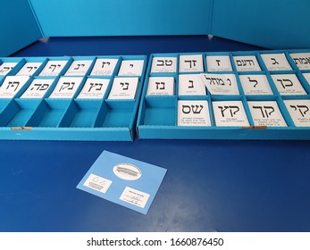 TEL AVIV, ISRAEL. March 2, 2020. Voting Ballot Envelope Over A Blue Box With White Ballots At The 23 Knesset Parliamentary Elections In Israel. Israel Democracy Concept Image.