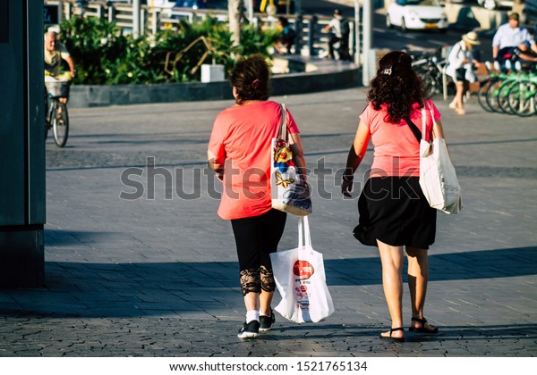 Tel Aviv Israel\
October 03, 2019 View of unknowns people walking in the streets of\
Tel Aviv in the afternoon