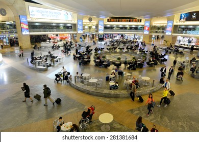 TEL AVIV - MAR 20 2015:Passengers In Terminal 3 Of Ben Gurion Airport, Israel.It Considered To Be Among Best Airports In The Middle East Due To Its Passenger Experience And Its High Level Of Security.