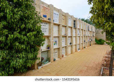 TEL AVIV - OCT. 26, 2019: Multi-level Burial Headstones At  A Secular Civil And Jewish Cemetery In Israel At The Outskirts Of Tel Aviv.  Hebrew And Russian Texts Note Names/details Of The Deceased