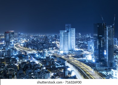 Tel Aviv Skyline At Night, Skyscraper and Ayalon Freeway - Toned In Blue