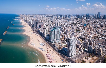 Tel Aviv skyline off the shore of the Mediterranean sea - Panoramic aerial image
