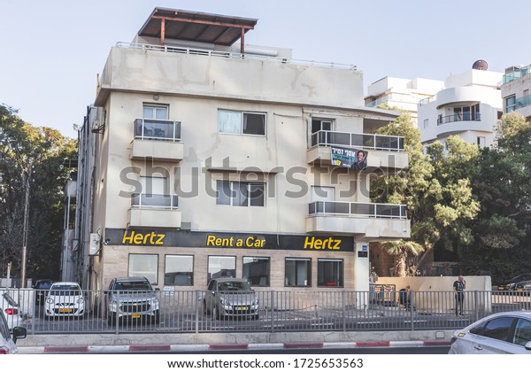 Tel Aviv/Israel-12/10/18: Hertz car rental on\
HaYarkon Street. Hertz is an American car rental company based in\
Florida, USA. It is the second-largest US car rental company\
operates in 150 countries