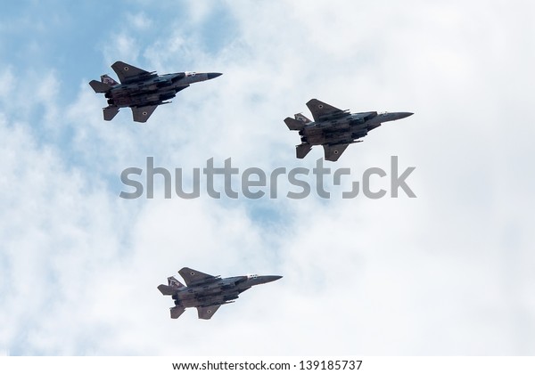 TEL NOF, ISRAEL -APRIL\
16: Army fighter jet F-15 performing an exhibition exercise during\
the Israeli Independence day show on April 16, 2013 in Tel Nof,\
Israel.