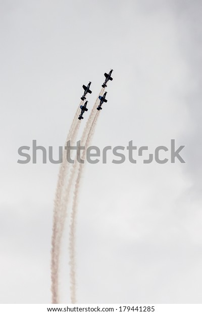 TEL NOF, ISRAEL -APRIL\
17: Four army training airplanes performing an exhibition exercise\
during the Israeli Independence day show on April 17, 2013 in Tel\
Nof, Israel.