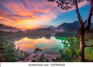 Telaga Warna, is a geothermal lake in Dieng Plateau, Central Java Indonesia, in Sunrise sky time