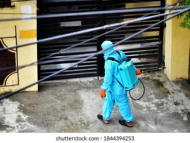 Telangana, Hyderabad - July 12, 2020: Man Wearing Protective Suit Disinfecting In The Spread Of Coronavirus, Covid -19 In The Hyderabad City