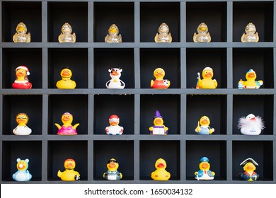 Tel-Aviv, Israel - December 01, 2019: Tel-Aviv Rubber Duck Store. Black Showcase With Variety Yellow, White And Shiny Rubber Ducks. Collection Of Plastic Toys For Bath In Souvenir Store