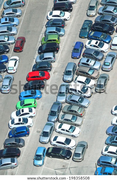 TEL-AVIV, ISRAEL - MAY 22 :\
Aerial view of full cars city parking on May 22, 2014 in Tel Aviv,\
Israel. The government has promoted park and ride to reduce traffic\
congestion