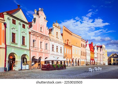 Telc, Czech Republic. Main Hradce Square of Telc with its famous 16th-century colorful houses, a UNESCO World Heritage Site, on a sunny day with blue sky and clouds, historical Moravia.