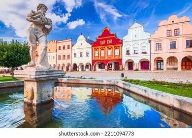 Telc, Czech Republic. Main square of Telc with its famous 16th-century colorful houses, a UNESCO World Heritage Site, on a sunny day with blue sky and clouds, historical Moravia.