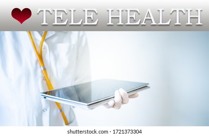 Tele Health Concept Doctor With Tablet On A Laptop Screen