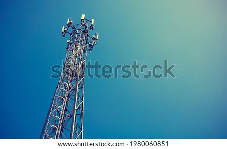 Telecom mast or Telecommunication mast TV antennas wireless technology with blue sky background, Show telecom tower infrastructure. Vintage concept