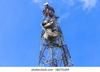 Telecommunication Radio Antenna And Satelite Tower With Blue Sky