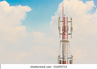 Telecommunication Radio Antenna And Satelite Tower With Blue Sky