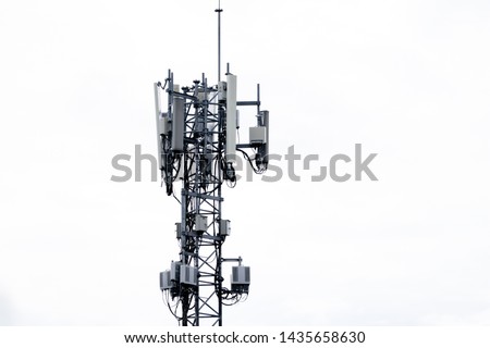 Telecommunication tower of 4G and 5G cellular. Base Station or Base Transceiver Station. Wireless Communication Antenna Transmitter. Telecommunication tower with antennas isolated on white background.