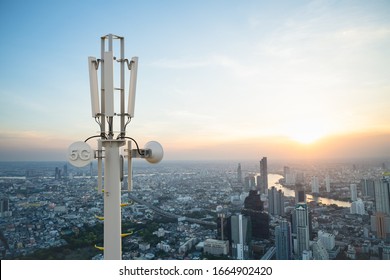 Telecommunication Tower With 5G Cellular Network Antenna On City Background