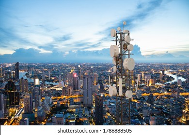 Telecommunication tower with 5G cellular network antenna on night city background - Shutterstock ID 1786888505