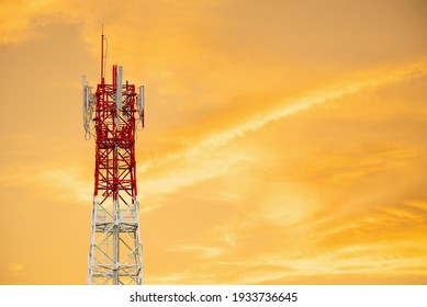 Telecommunication Tower With Gold Sky Background.