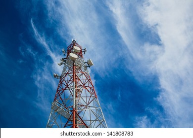 Telecommunication tower and sky blue .