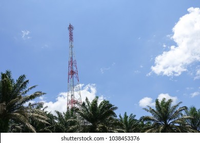 The telecommunication tower in sky with clouds background