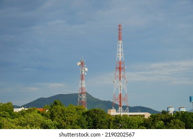 Telecommunications Towers In Rural Areas. 5G Cell Site And Telecom Base Station In Forest.