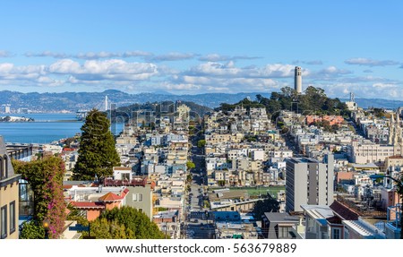 Telegraph Hill - A panoramic view of neighborhoods of Telegraph Hill, Coit Tower and San Francisco Bay, looking from top of Russian Hill, San Francisco, California, USA. 