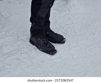 Telemark skiing is technique that combines elements of Alpine and Nordic, using rear foot to keep balance while pushing on front foot to create a carving turn on downhill , ski lift