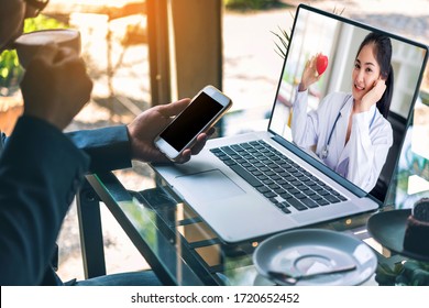 Telemedical Of Beautiful Asian Doctor Video Conference Call Online Talking For Follow Up Remotely With Medical Coronavirus Result At Home. Online Healthcare Digital Technology Service And Support.