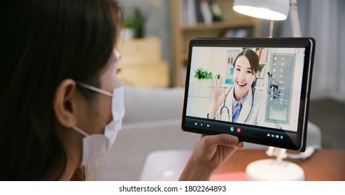 Telemedicine Concept -  Asian Female Patient Listening To Male Doctor Talking Symptom On The Tablet And Make A Discussion With Ok Gesture