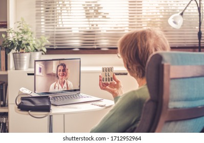 Telemedicine Concept Elderly Woman Speaking To Her Doctor Online And Taking Her Blood Pressure