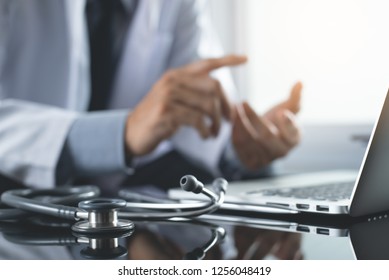 Telemedicine, Medical Online, E Health Concept. Doctor Video Chat With Patient Via Laptop Computer, Mobile Health Application. Doctor Video Conferencing, Cropped Image.