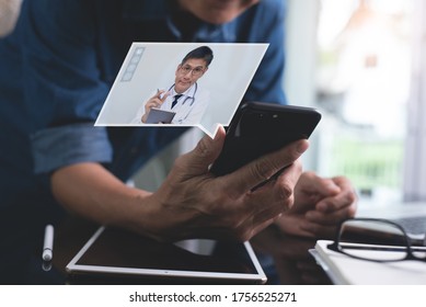 Telemedicine, Telehealth, Medical Online, Ehealth Concept.  Asian Doctor Giving Health Education By Video Calling, Using Zoom Online Meeting App On Mobile Smart Phone To Client On Video Health Channel