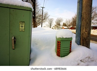 A Telephone Box Covered In Snow