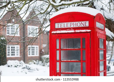 Telephone Box With Snow