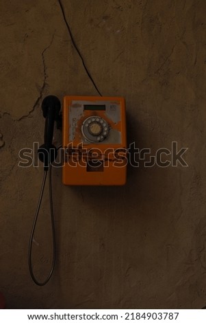 Similar – yellow retro telephone on pink wall, china