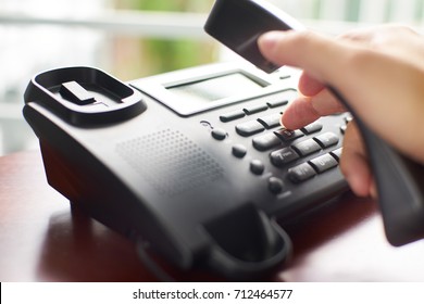 Telephone dialing ,contact and customer service concept . Selected focus .