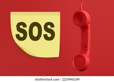 Telephone Handset On Red Background. Emergency SOS Call