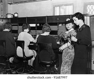 Telephone operators at switchboard
