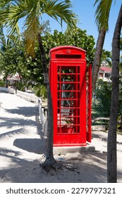 telephone phonebox red color. telephone phonebox on the beach.