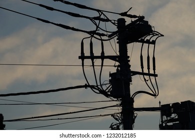 Telephone Pole And Dusk