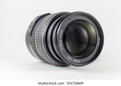 A Telephoto Lens On A White Background