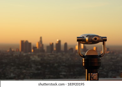 Telescope landscape viewer looking south, out-of-focus downtown Los Angeles, California in the background. View from the Griffith Park Observatory. - Shutterstock ID 183920195