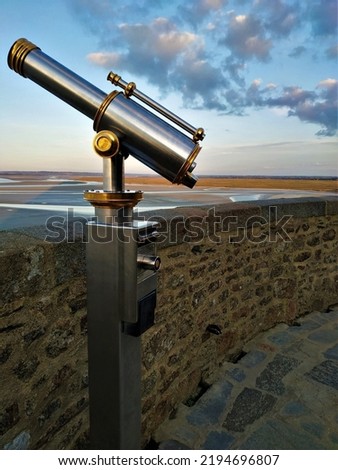 telescope stainless steel pedestal fortress panoramic view canal de la manche in prison abbey french commune war one hundred years normandy world heritage sand beach