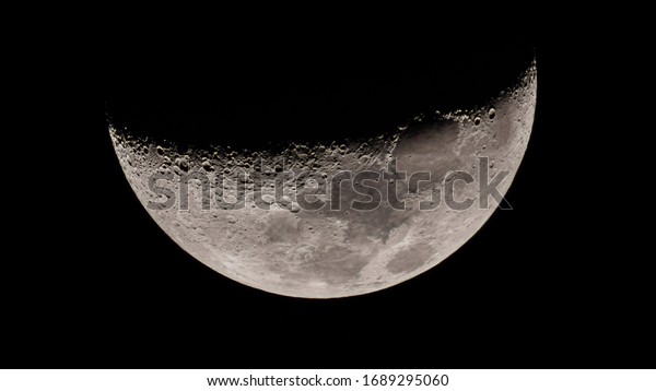 A telescope view of a 35% Waxing Crescent Moon at\
1000mm focal length.