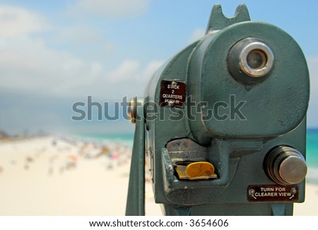 Telescope Viewfinder Overlooking Crowded Beach