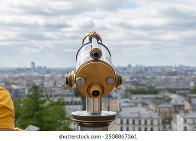 A telescope to watch Paris from Montmartre, France. - Powered by Shutterstock