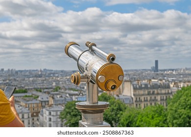 A telescope to watch Paris from Montmartre, France. - Powered by Shutterstock