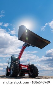 Telescopic Loader Against The Blue Sky